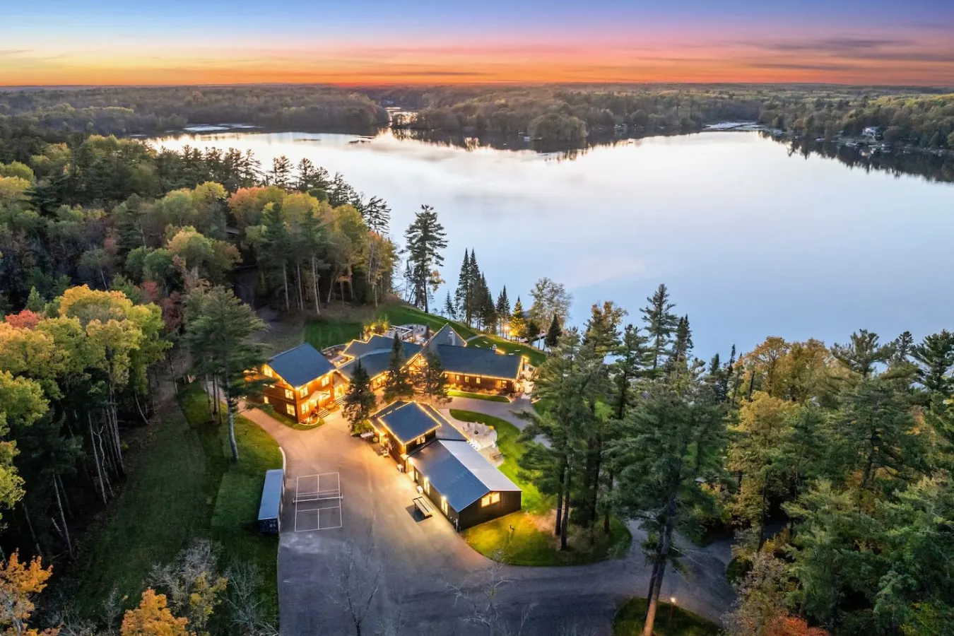 Aerial view of the estate and Long Lake at sunset